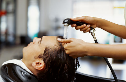 Hair being washed and rinsed
